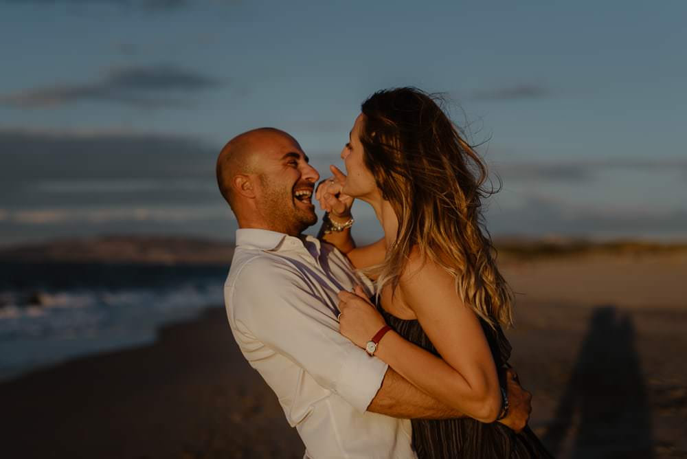 Engaged on the beach in alghero